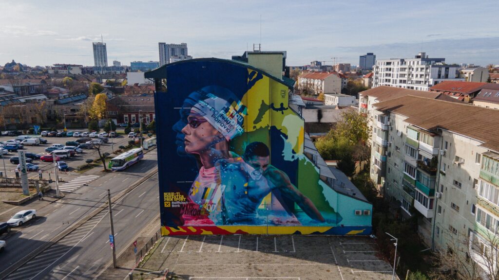 Mural de 400 de metri pătrați cu David Popovici pe o clădire din Timișoara