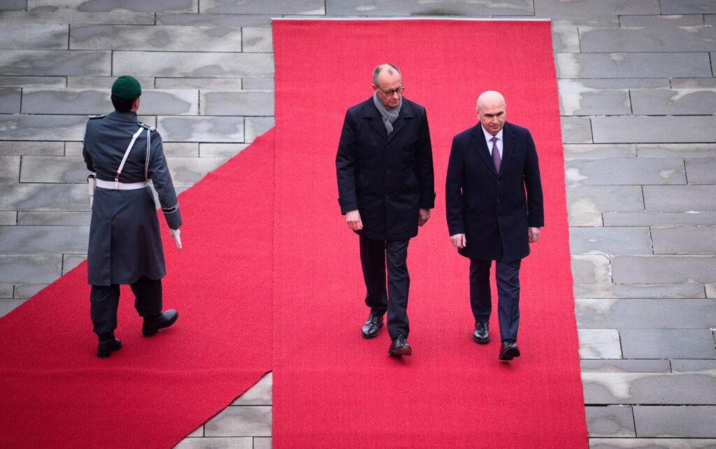 Merz, invitat la București de premierul Ilie Bolojan